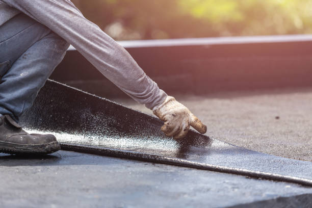 Professional Basement Waterproofing technician working in Walton, KS